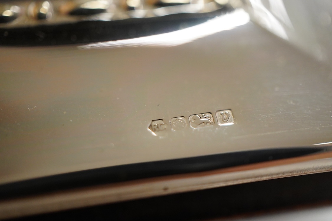 A pair of modern silver mounted photograph frames, 20.8cm and matching larger frame, 23.2cm, by Carr's of Sheffield, Ltd, Sheffield, 1996, together with one other modern silver mounted photograph frame and a similar Ital